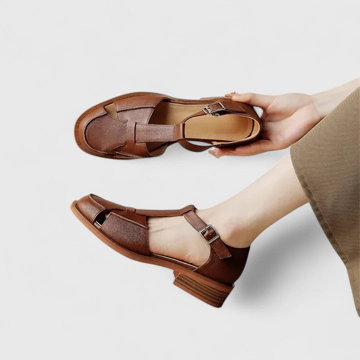 Isara | Low block heel sandals with side cut-out detail